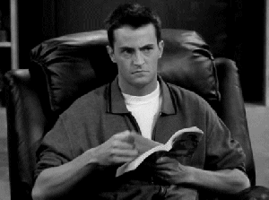 Chandler Bing reading book